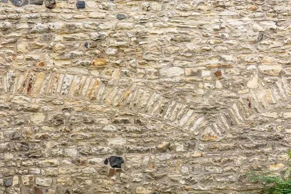 Old sandstone wall. Background from beautiful old sandstone. — Stock Photo, Image