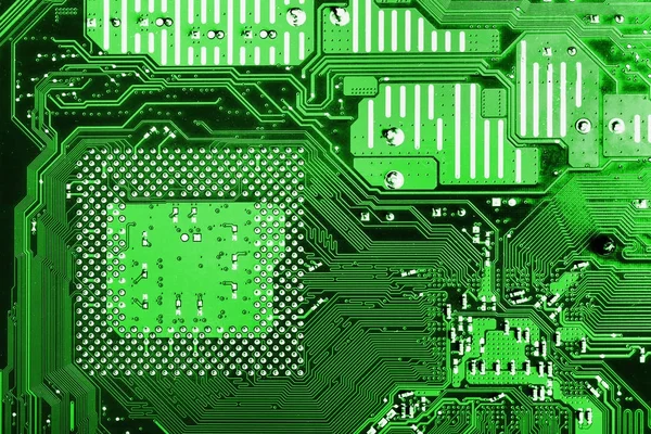 Tło zielony obwodu drukowanego płyty głównej komputera. Płytka tle. — Zdjęcie stockowe