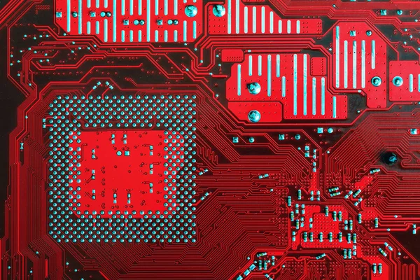 Tło czerwone płytki drukowanej płyty głównej komputera. Płytka tle. — Zdjęcie stockowe
