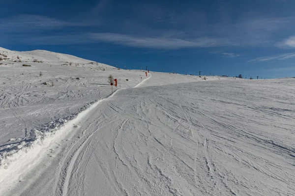 Dolomites, ski area with beautiful slopes. Empty ski slope in winter on a sunny day. Prepare ski slope, Alpe di Lusia, Italy — Stock Photo, Image