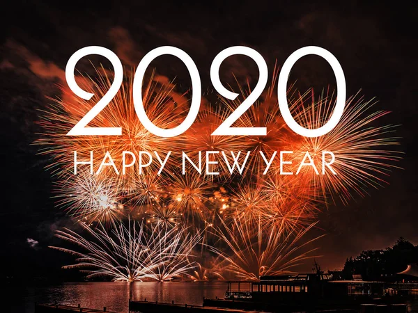 Gelukkig nieuwjaar 2020 met vuurwerk achtergrond — Stockfoto