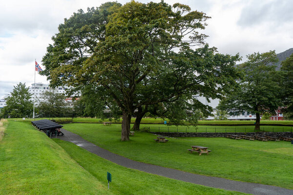 Norway, Scandinavia: Beautiful park near the Bergenhus fortress in August 2019