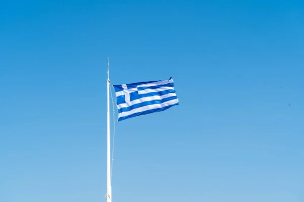 Flag of Greece on the blue sky background. Athens, August 2019 — Stock Photo, Image