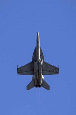 Airplane US Military F-18 fighter jet flying at 2016 Huntington Beach Air Show clipart
