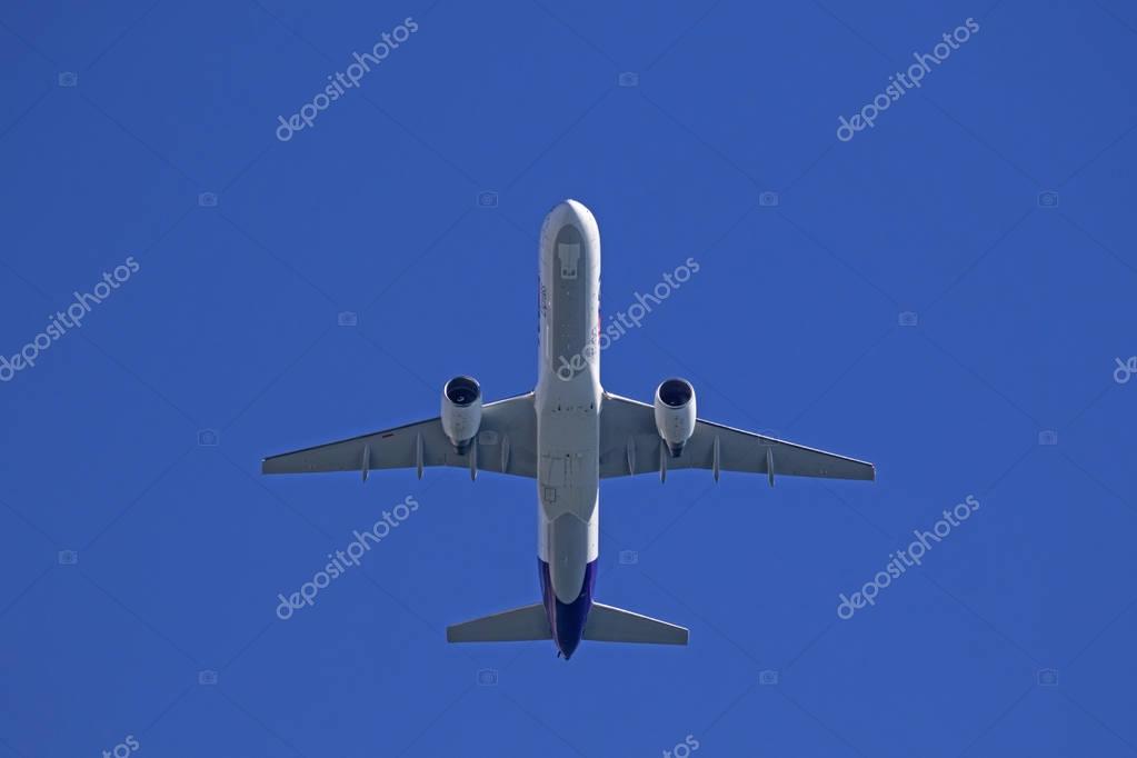 Huntington Beach, California,USA-October 23,2016. FedEx cargo jet flying at 2016 Huntington Beach Air Show in Southern California. The 2016 Huntington Beach Air Show featured 3 days of military aircraft flying free to the public.