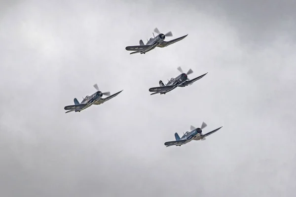 Airplanes WWII F4-U Corsair fighter aircraft flying at California Air Show Stock Photo
