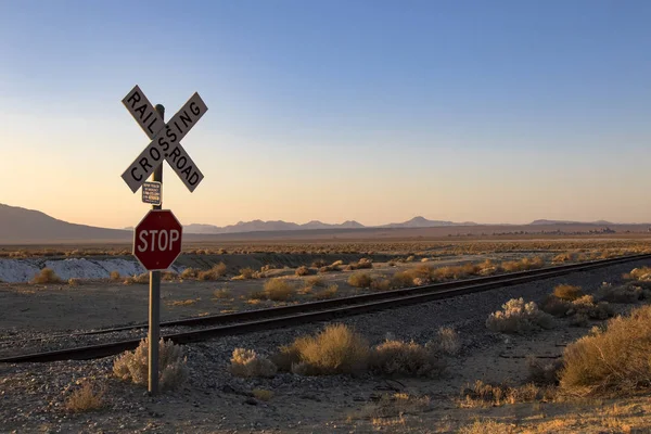 Railroad crossing at Trona Pinnacles in the California desert — Stock Photo, Image