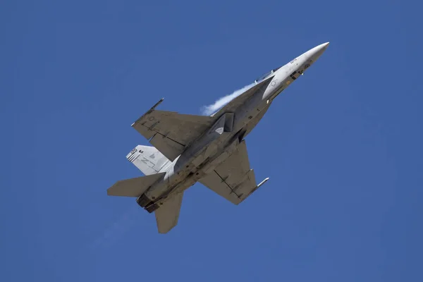 Airplane F-18 Hornet jet fighter flying at air show — Stock Photo, Image
