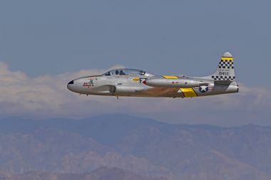 Airplanes Korean War jets flying at Los Angeles Air Show. Los Angeles, California,USA - March 24,2018. The 2018 Los Angeles Air Show features military and civilian air acts performing for 2 days. clipart