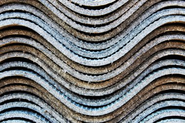 Katlanmış dalgalı bir levhanın fotoğrafı. İnşaat malzemesi.