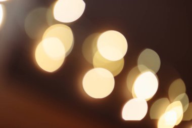 Soyut sarı parlak ışıkların arka planı, altın ve siyah lüks konsept 