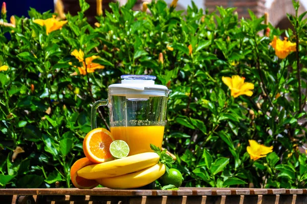 Glass Flask Blender Juice Wooden Table Next Lime Banana Orange — Stock Photo, Image