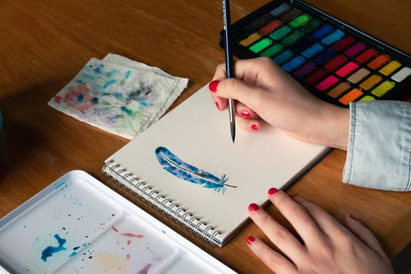 Lady Close Hand Red Nails Painting Feather Using Watercolor Technique — Stock Photo, Image