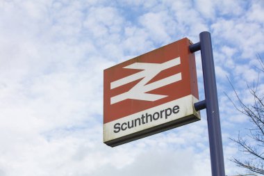 Scunthorpe Station Sign- Scunthorpe, Lincolnshire, United Kingdom - 23rd January 2018 clipart