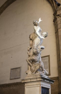 The sculpture 'The Rape of the Sabine Women' outside the Loggia dei Lanzi and in the Piazza della Signoria, Florence, Italy, 22nd May 2016 clipart