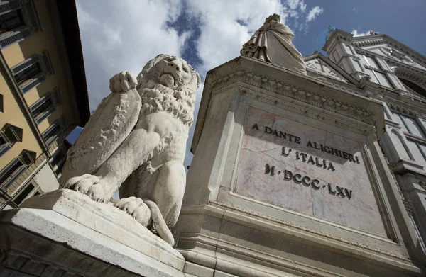 Lion statue and statue of Dante outside the Basilica di Santa (Basilica of the Holy Cross), Florence, Italy - 23rd May 2016