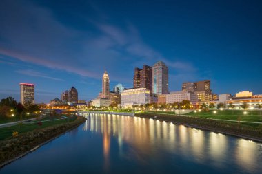 View of downtown Columbus Ohio Skyline at twilight clipart