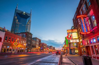 NASHVILLE - NOV 11: Neon signs on Lower Broadway Area on November 11, 2016 in Nashville, Tennessee, USA clipart