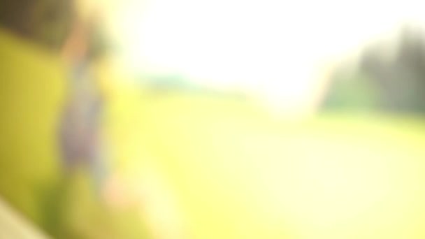 Blurred Footage Man Paragliding Green Field — Wideo stockowe