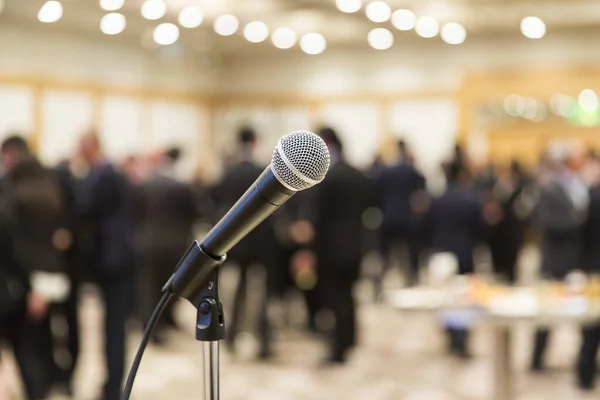 Microphone for speech set on a stand at an indoor event venue