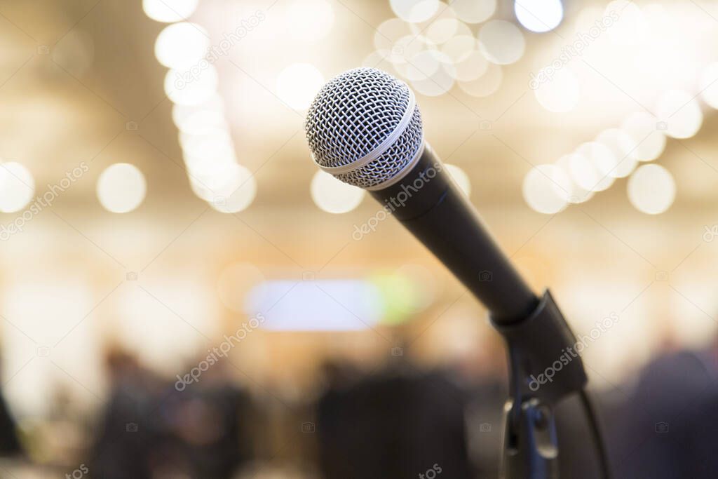 Microphone for speech set on a stand at an indoor event venue