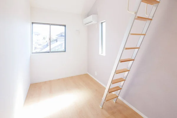 Attic and stairs (ladder) in the living room of a house