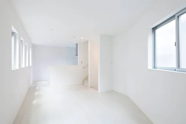 Living space in a newly built apartment with no furniture