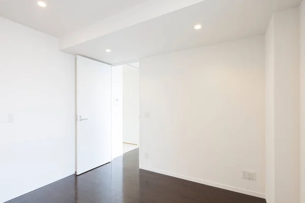 Living space in a newly built apartment with no furniture