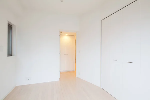 Living space in a newly built apartment with no furniture