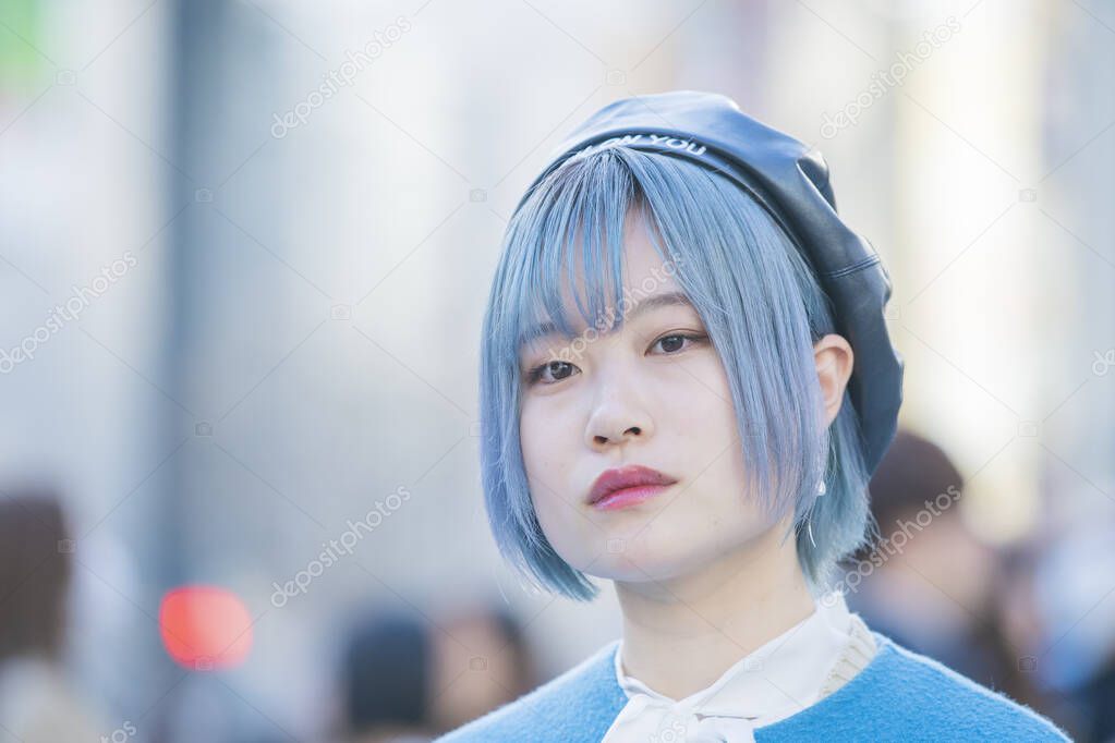 Young Asian woman with blue hair in Shibuya (Tokyo, JAPAN)