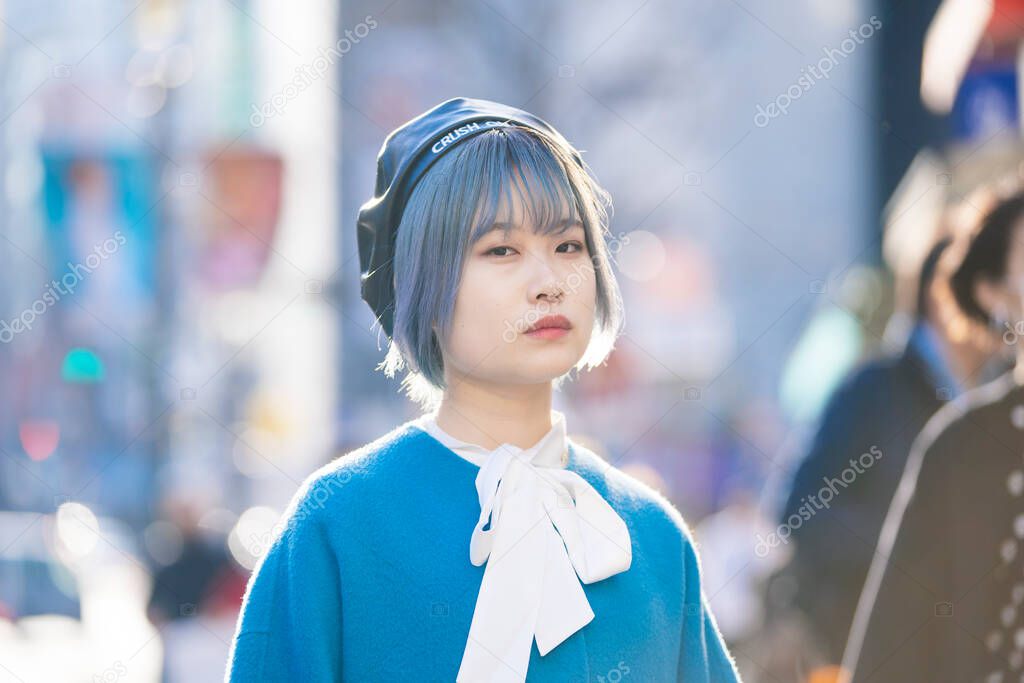 Young Asian woman with blue hair in Shibuya (Tokyo, JAPAN)