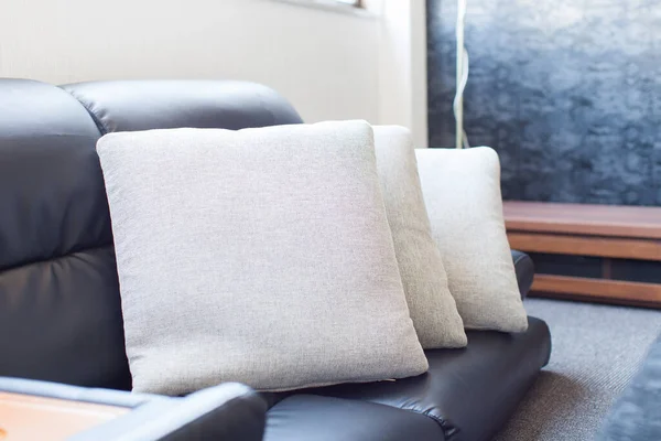 cushions on the sofa in clean and relaxing living room