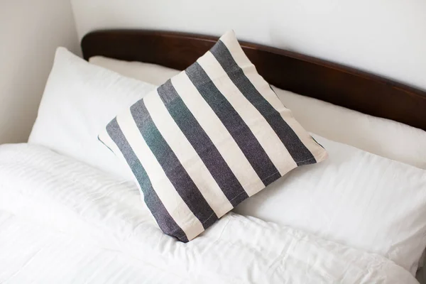 cushions on the sofa in clean and relaxing living room