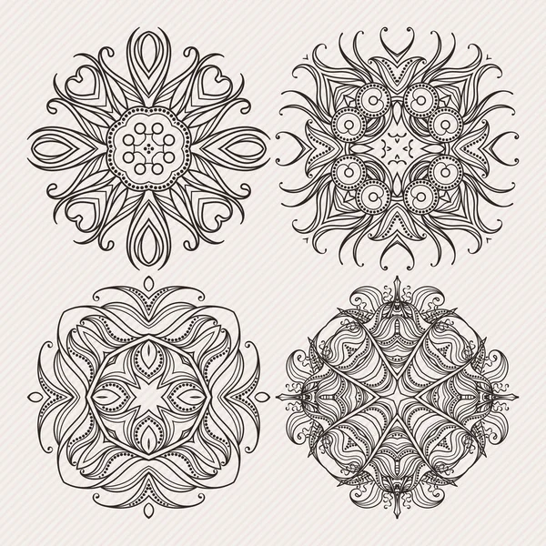 Ensemble de symboles mandala vectoriels ornés. Tatouage de dentelle Mehndi. Tissage Art Nouveau . — Image vectorielle