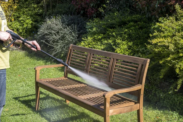 Man Cleaning Wooden Garden Bench High Pressure Cleaner Spring Time — Stock Photo, Image