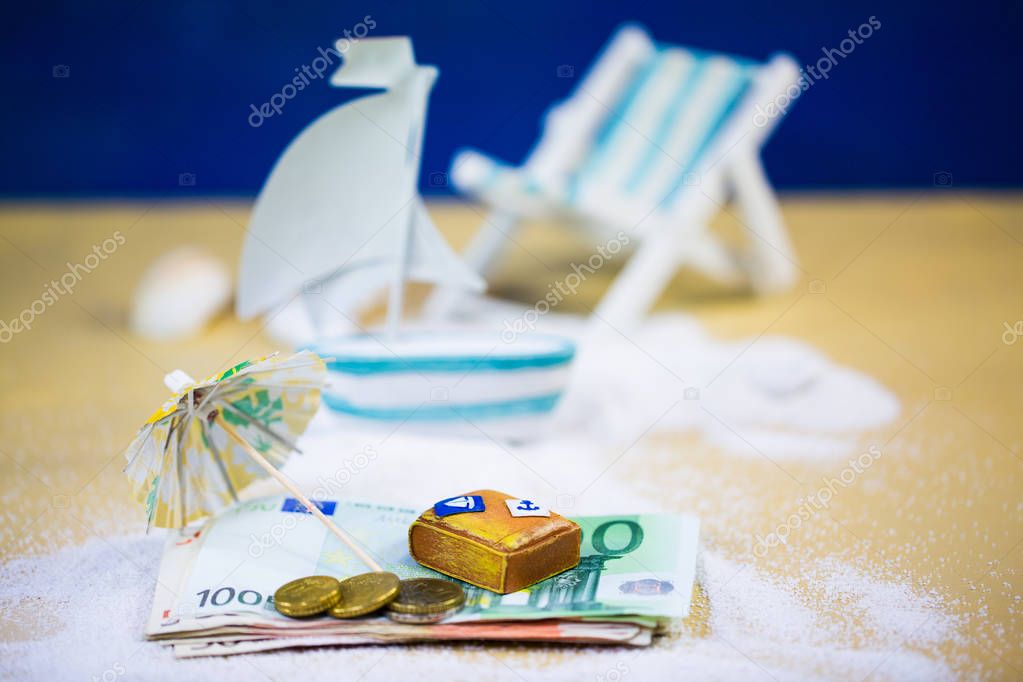 Ship lying on money, deck chair, vacation