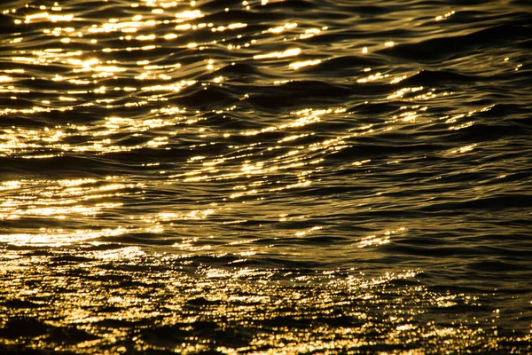 Resplandeciente mar en la puesta del sol —  Fotos de Stock