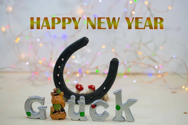 Horseshoe with luck, symbolic of New Year's Eve — Stock Photo, Image