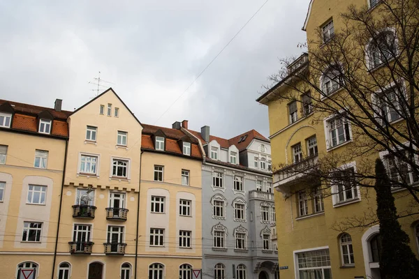 Row of houses with old building houses in Schwabing, colorful fa