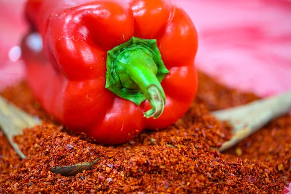 Pepper on paprika flakes