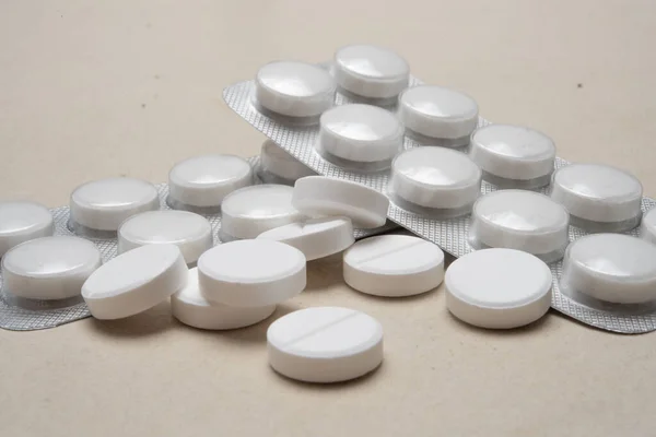 White medicine pill (pack of pills)