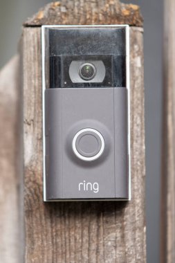 Chicago Illinois, USA - Circa 2020: A Ring Video Doorbell was just installed by a new home owner clipart