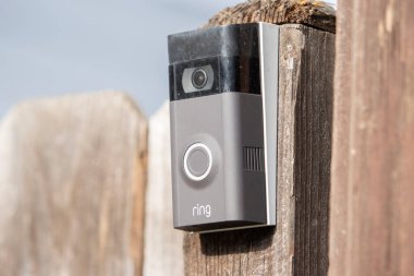 Chicago Illinois, USA - Circa 2020: A Ring Video Doorbell was just installed by a new home owner clipart