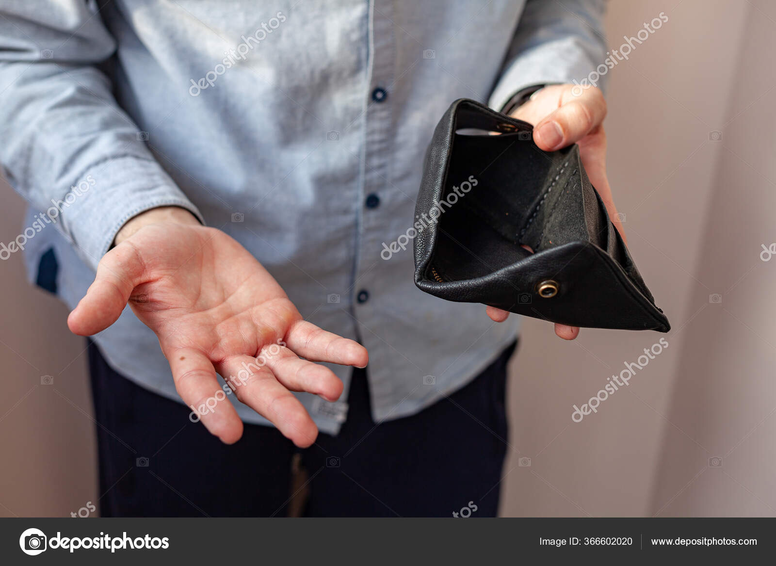 Poor woman showing her empty purse, isolated on white Stock Photo - Alamy
