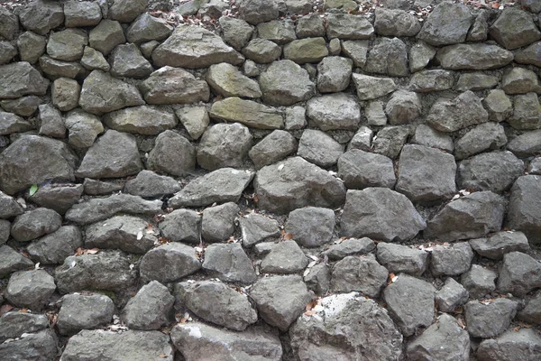 Alte Dunkle Mauer Aus Naturstein — Stockfoto