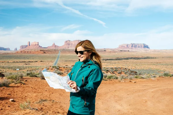 A tourist woman in Monument Valley in Utah, USA.