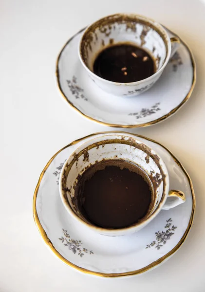 A cup of Turkish coffee, traditionally using for fortune telling. traditional porcelain turkish coffee cup