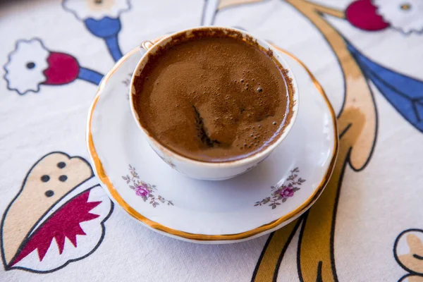 A cup of Turkish coffee, traditionally using for fortune telling. traditional porcelain turkish coffee cup