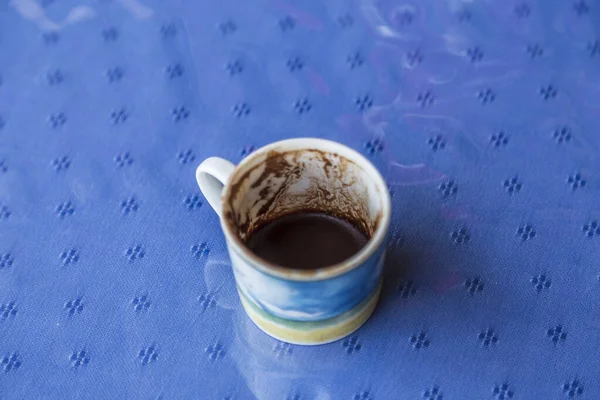 cup of Turkish coffee, traditionally using for fortune telling. traditional porcelain turkish coffee cup