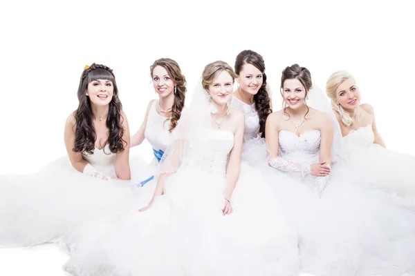 Cuatro novias aisladas en blanco — Foto de Stock